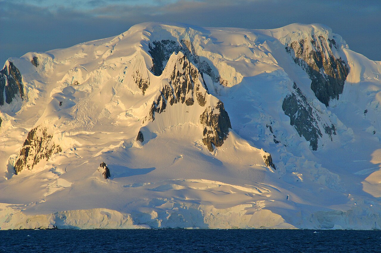 Snow-covered mountains and coastline of the Antarctic Peninsula